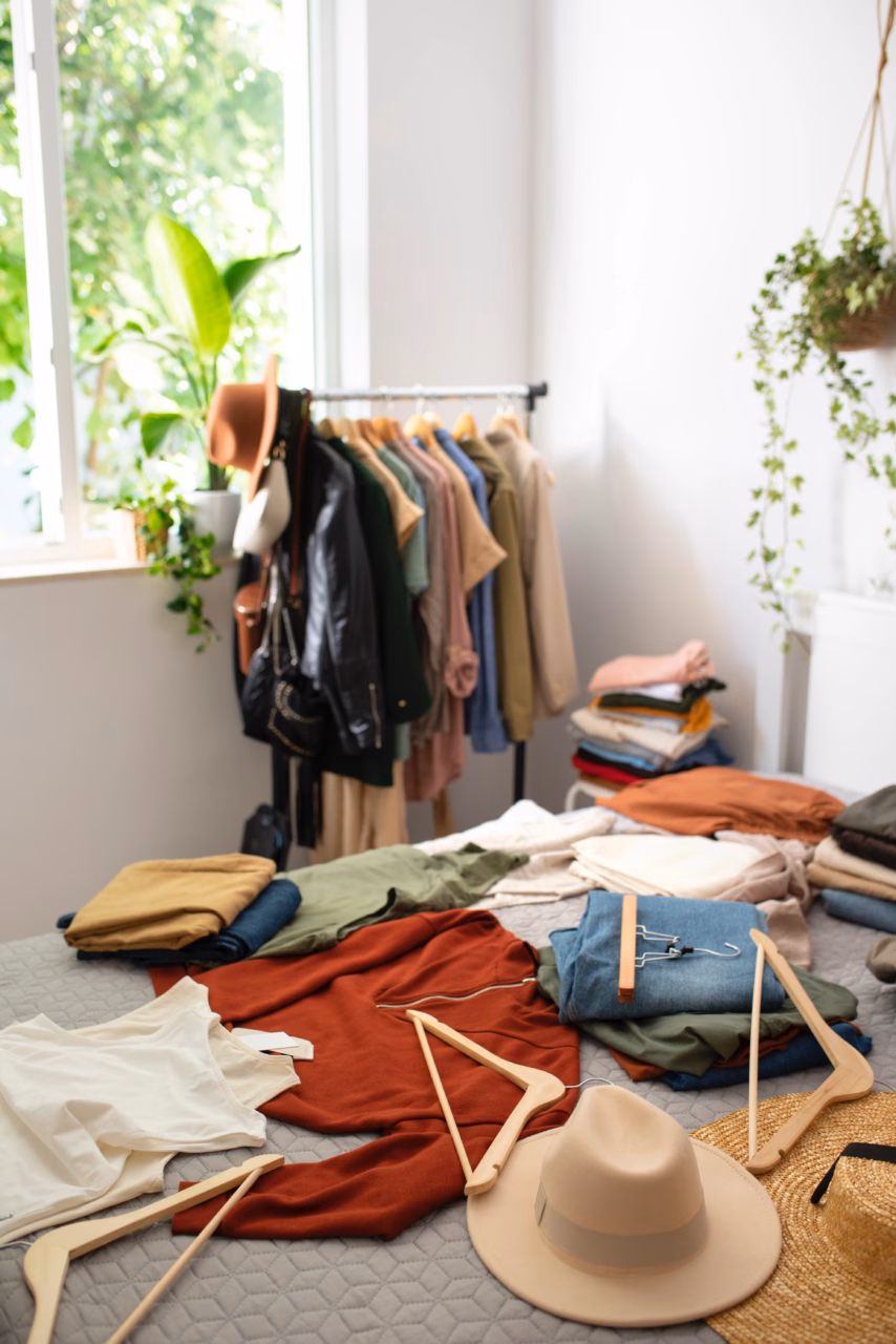 clothes-bed-fast-fashion-high-angle